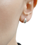 Silver stud earrings by Mounir  