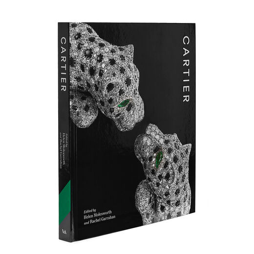 The official book cover for the V&A Cartier exhibition features a detail of two jewelled panthers which make part of a bangle.